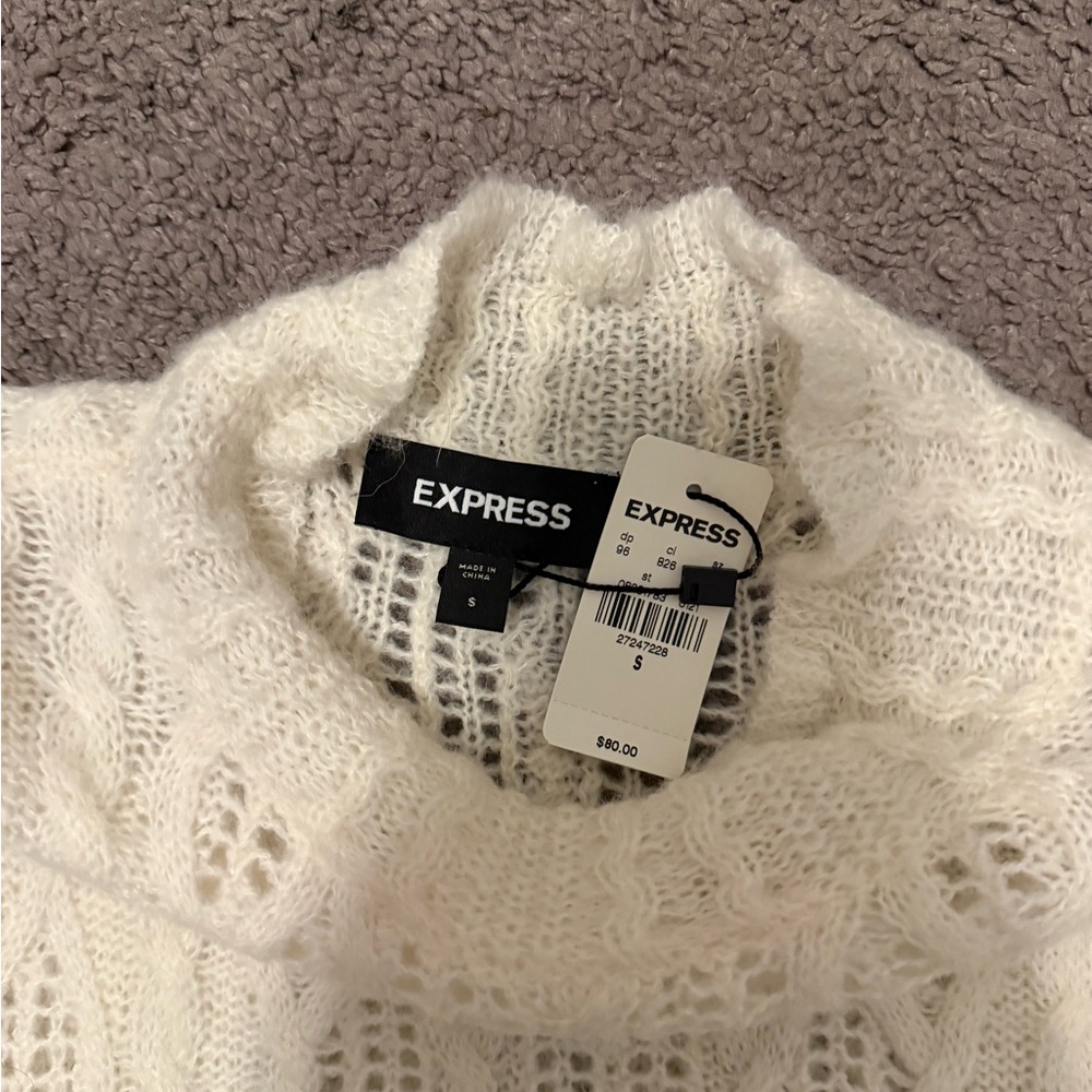 Express Knitted waist cinching sweater.